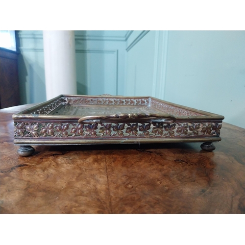 111 - Edwardian embossed brass Punch and Judy serving tray. {5 cm H x 36 cm W x 23 cm D}.