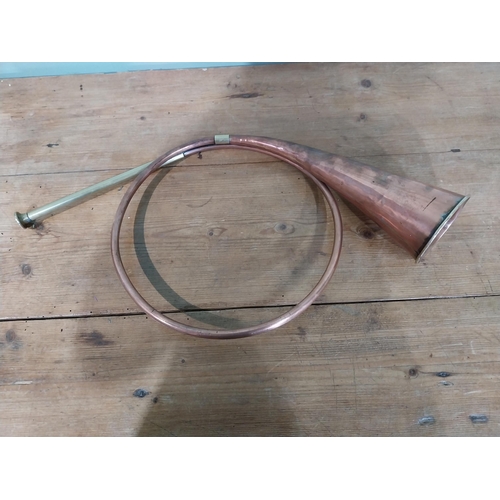 44 - Edwardian brass and copper bugle. {50 cm H x 26 cm Dia.}.