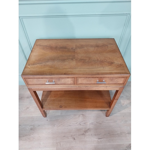 54 - 1950's walnut side table with two drawers in the frieze by Heal's of London. {85 cm H x 87 cm W x 57... 