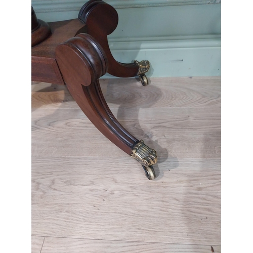 463 - Regency mahogany and rosewood card table on turned column on four outswept feet. {72 cm H x 91 cm W ... 