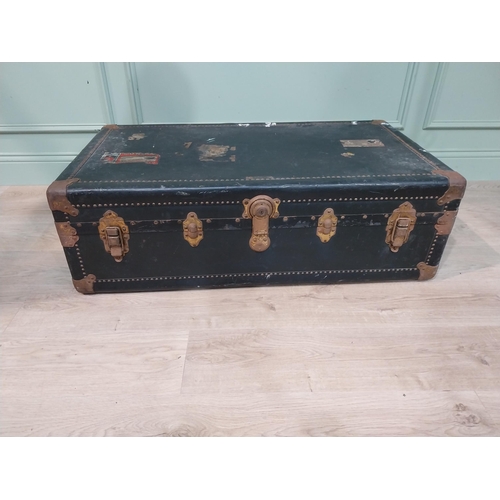473 - Early 20th C. canvas travelling trunk with various Cunard Line and other labels. {32 cm H x 104 cm W... 