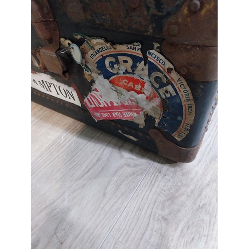 473 - Early 20th C. canvas travelling trunk with various Cunard Line and other labels. {32 cm H x 104 cm W... 