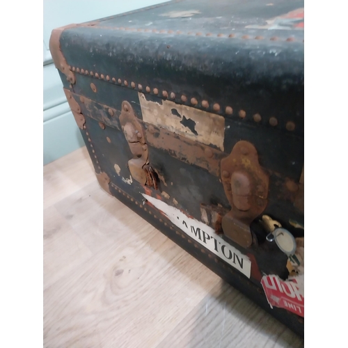 473 - Early 20th C. canvas travelling trunk with various Cunard Line and other labels. {32 cm H x 104 cm W... 