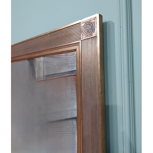 483 - Decorative gilt wall mirror in the Regency style. {79 cm H x 100 cm W}.