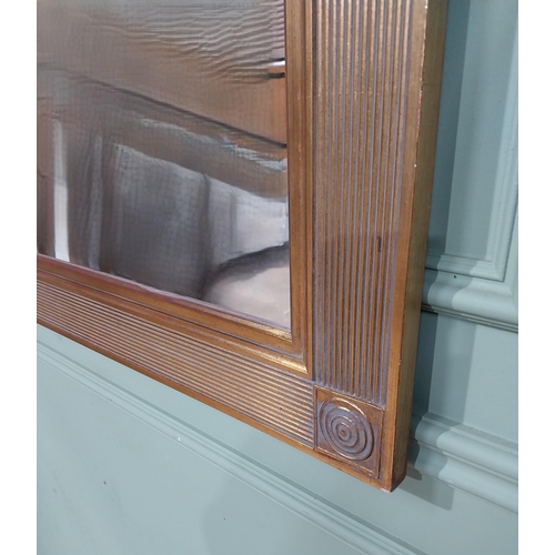 483 - Decorative gilt wall mirror in the Regency style. {79 cm H x 100 cm W}.
