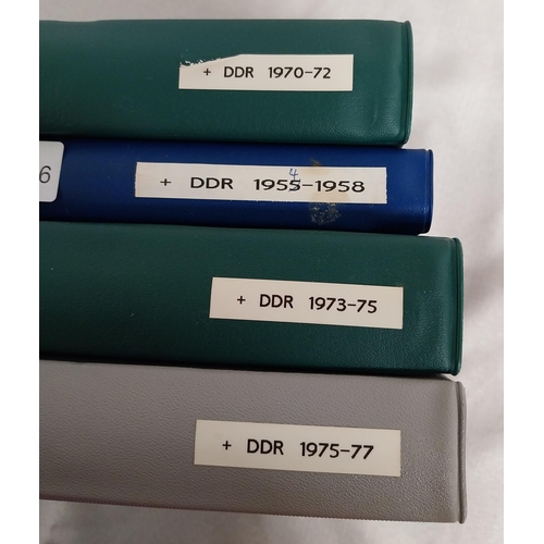 572 - Four albums of East German stamps. 1955 - 1958, 1970 - 1972, 1973 - 1975 & 1975 - 1977.