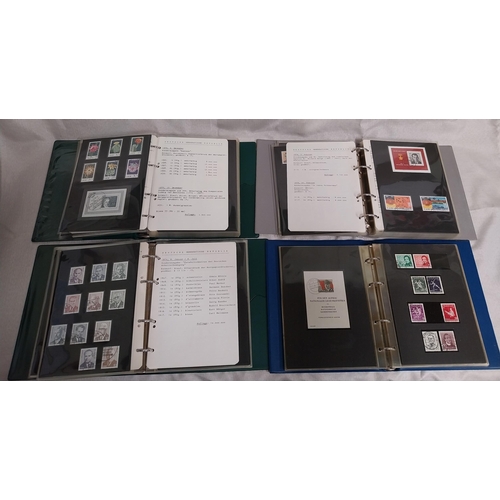 572 - Four albums of East German stamps. 1955 - 1958, 1970 - 1972, 1973 - 1975 & 1975 - 1977.
