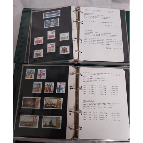 572 - Four albums of East German stamps. 1955 - 1958, 1970 - 1972, 1973 - 1975 & 1975 - 1977.