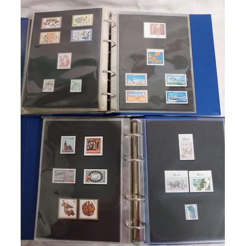 Four albums of unfranked German Berlin stamps. 1948 - 1965, 1966 - 1974 ...