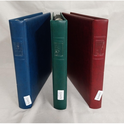 606 - Three albums of World stamps 1920 - 2004.