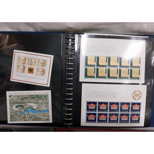 606 - Three albums of World stamps 1920 - 2004.