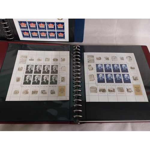 606 - Three albums of World stamps 1920 - 2004.