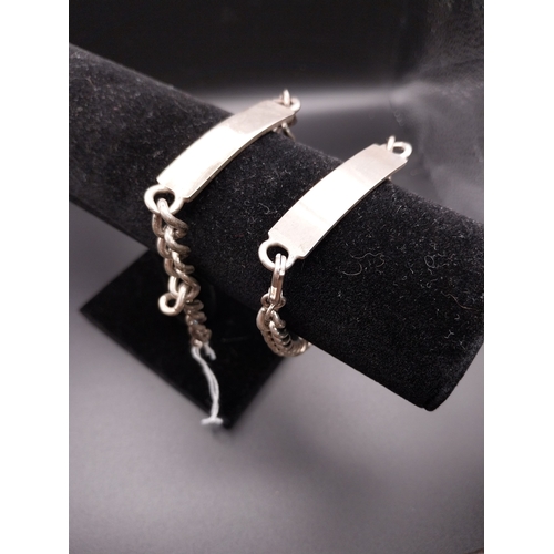 518 - Pair of Gents Identity bracelets Hallmarked Sheffield 1975. 43.1 grams & 35.9 grams. Available to vi... 