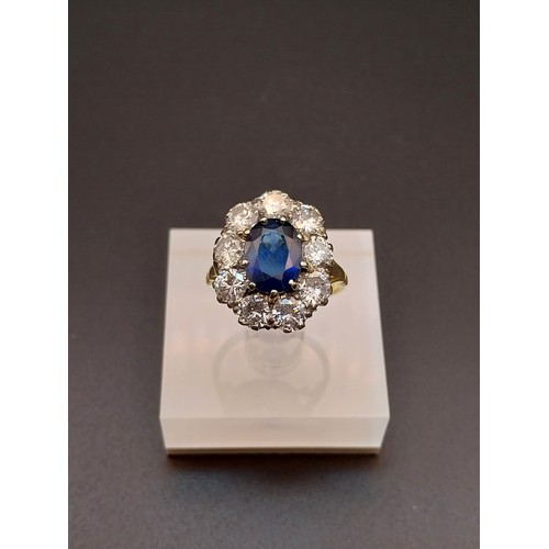 504 - 18ct gold cluster diamond and 2ct Sapphire ring. Size N. Available to view on request.