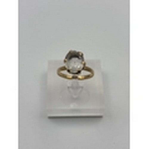 541 - Gold ring with single paste stone, rubbed mark