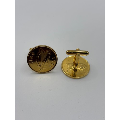 544 - Pair of gold coloured cufflinks with Irish 5p detail.
