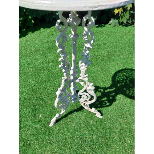 613 - Decorative cast iron garden table on three outswept legs. {69 cm H x 25 cm Dia.}.