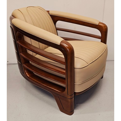 238 - Good quality chrome, leather and walnut aviator style armchair with open arms and chrome sections to... 