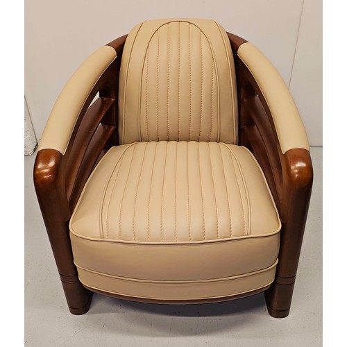 238 - Good quality chrome, leather and walnut aviator style armchair with open arms and chrome sections to... 