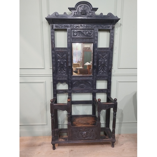 198 - Victorian carved oak hall stand with monk's bench seat. {239 cm H x 106 cm W x 40 cm D}.