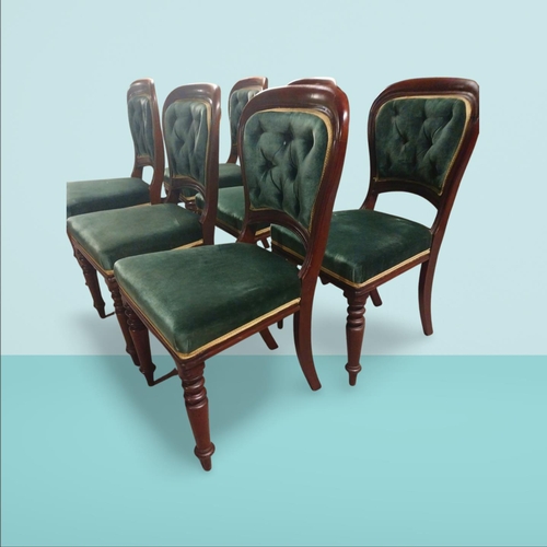 125 - Set of six Victorian mahogany and upholstered dining room chairs on turned legs and brass castors. {... 
