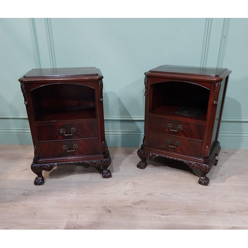 159 - Pair of carved mahogany bedside cabinets in the Victorian manner. {67 cm H x 52 cm W x 35 cm D}.