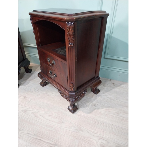 159 - Pair of carved mahogany bedside cabinets in the Victorian manner. {67 cm H x 52 cm W x 35 cm D}.