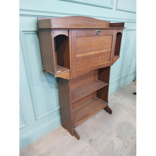 166 - Edwardian oak fold down desk with open bookshelf. {124 cm H x 98 cm W x 24 cm D}.