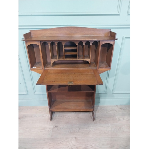 166 - Edwardian oak fold down desk with open bookshelf. {124 cm H x 98 cm W x 24 cm D}.