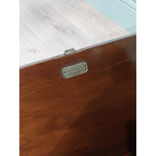 315 - Edwardian walnut music cabinet by M Robertsons. {56 cm H x 47 cm W x 27 cm D}.