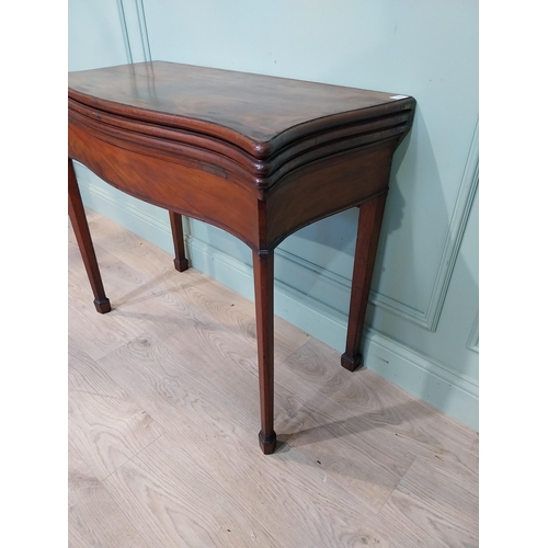 389 - Georgian mahogany triple fold games table on square legs. {77 cm H x 90 cm W x 41 cm D}