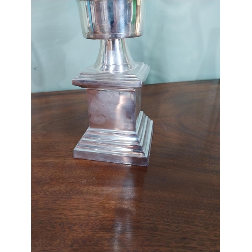 409 - Pair of chrome and glass candle holders. {48 cm H x 21 cm Dia.}.
