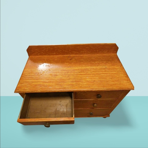 412 - 19th C. scumbled pine chest of drawers with gallery back on turned feet. {96 cm H x 102 cm H x 51 cm... 