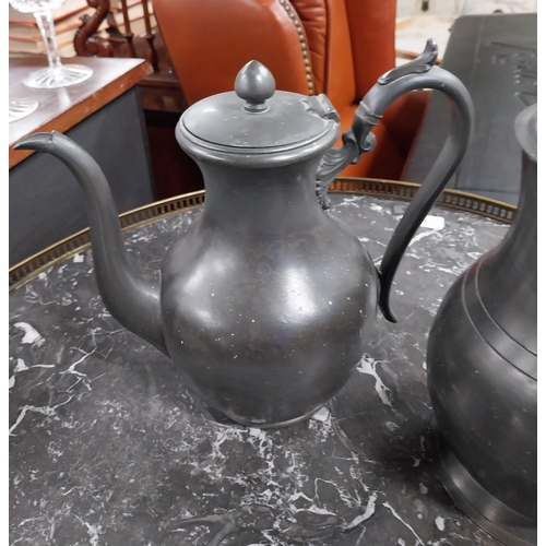 432 - 19th C. pewter flagon, tea pot and copper tankard. {22 cm H x 14 cm Dia, 21 cm H x 12 cm Dia and 17 ... 