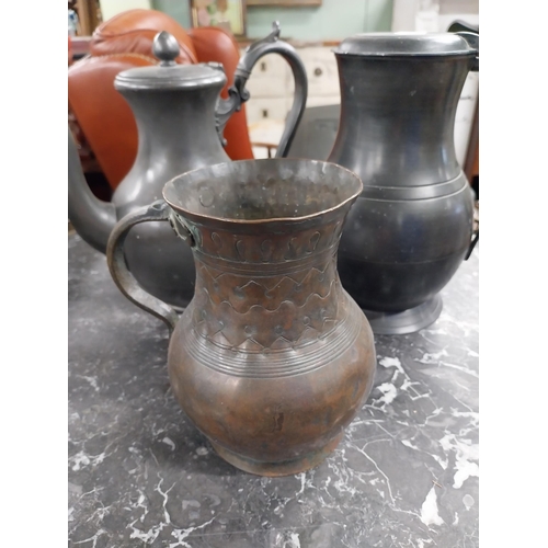 432 - 19th C. pewter flagon, tea pot and copper tankard. {22 cm H x 14 cm Dia, 21 cm H x 12 cm Dia and 17 ... 
