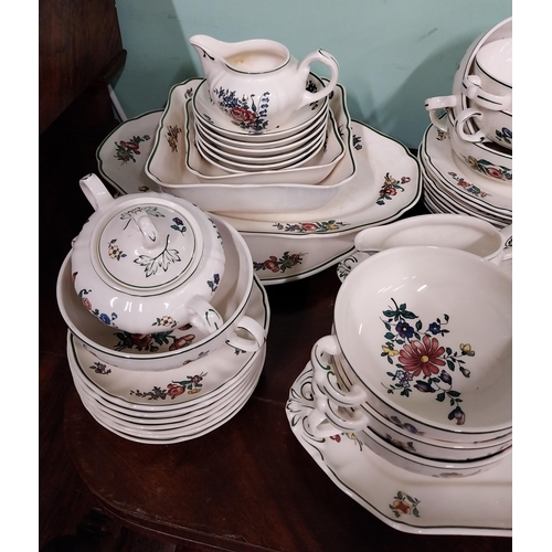 476 - Seventy piece Villeroy and Bosch floral ceramic dinner service.