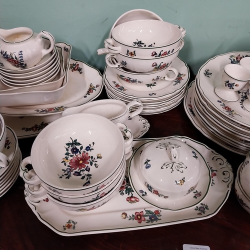 476 - Seventy piece Villeroy and Bosch floral ceramic dinner service.