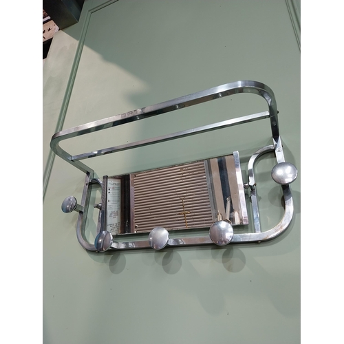 51 - Art Deco chrome mirrored back luggage rack. {34 cm H x 73 cm W x 26 cm D}.