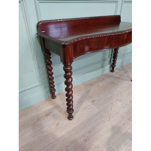 86 - Good quality 19th C. mahogany serpentine fronted console table on barley twist legs with gallery bac... 