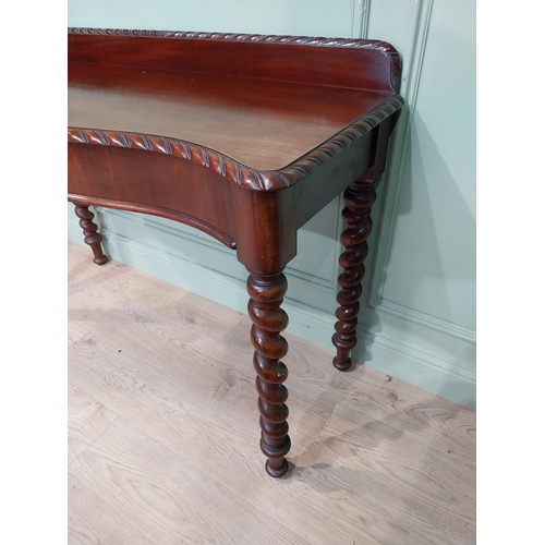 86 - Good quality 19th C. mahogany serpentine fronted console table on barley twist legs with gallery bac... 