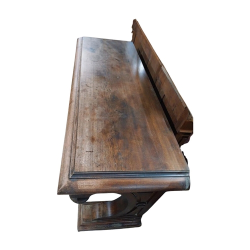 103 - Victorian oak console table on shaped supports and platform feet. {95 cm H x 200 cm W x 71 cm D}.