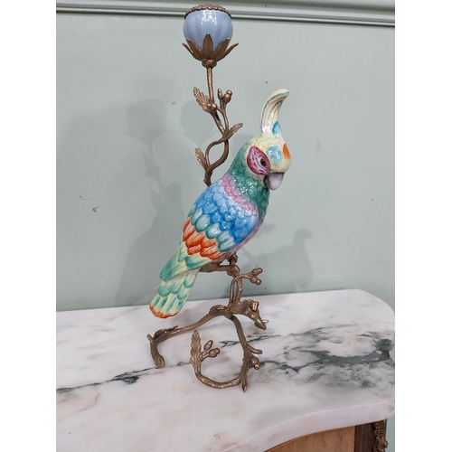 12 - Pair of good quality gilded metal and ceramic candlesticks in the form of Parrots. {34 cm H x 19 cm ... 