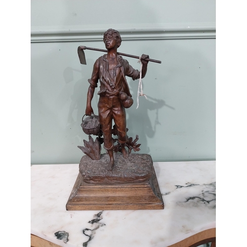 138 - Early 20th C. bronzed spelter figure of The Harvest on oak base. {40 cm H x 22 cm W x 17 cm D}.