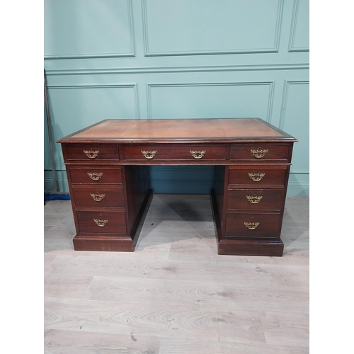 148 - Mahogany pedestal desk with inset leather top in the 19th C. style. {79 cm H x 140 cm W x 93 cm D}.