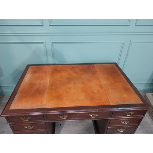 148 - Mahogany pedestal desk with inset leather top in the 19th C. style. {79 cm H x 140 cm W x 93 cm D}.