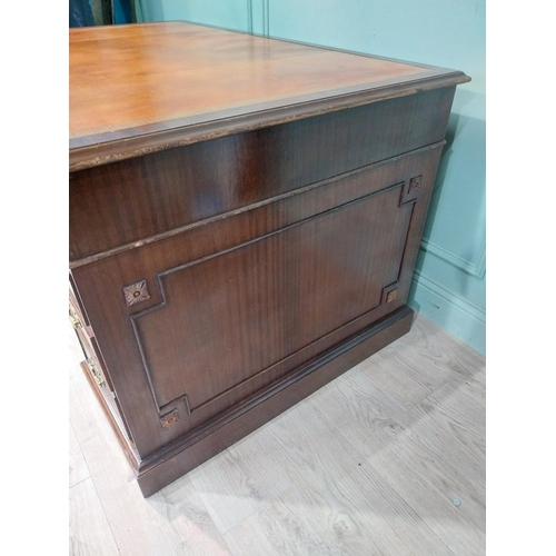 148 - Mahogany pedestal desk with inset leather top in the 19th C. style. {79 cm H x 140 cm W x 93 cm D}.