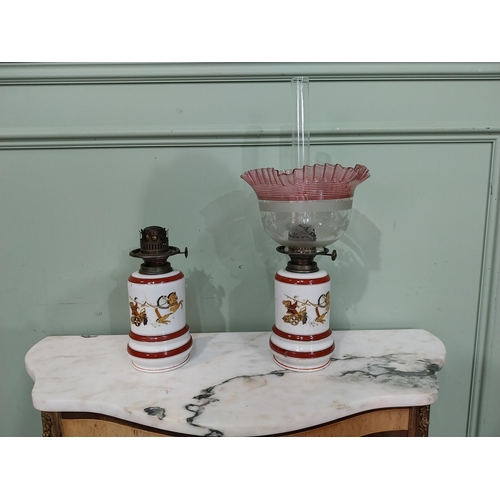 264 - Pair of 19th C. ceramic oil lamps decorated with Roman scenes  - one with original ruby glass shade.... 