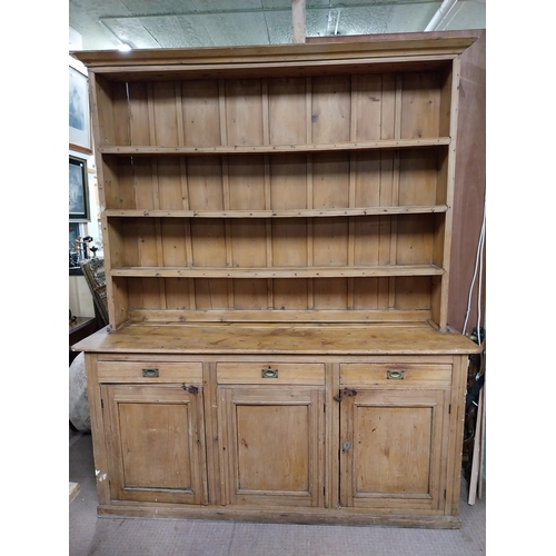 31 - Early 20th C. scrubbed pine Country House kitchen dresser with three drawers above three blind doors... 