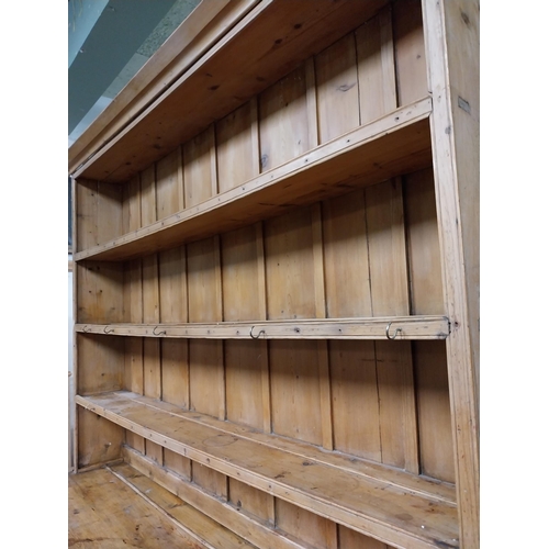31 - Early 20th C. scrubbed pine Country House kitchen dresser with three drawers above three blind doors... 