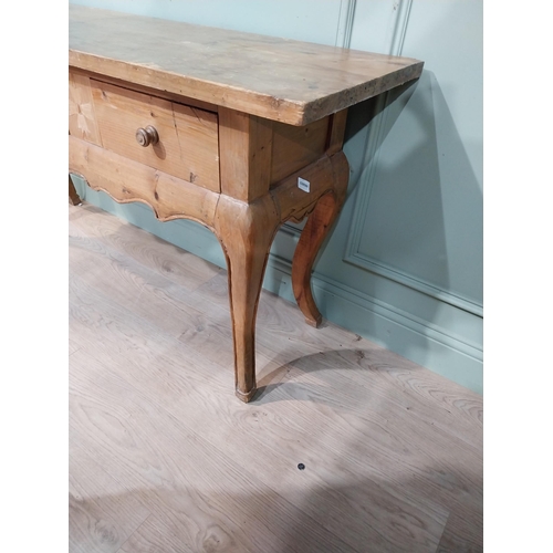 379 - 20th C. stripped pine side table on cabriole legs. {78 cm H  150 cm W x 45 cm D}.